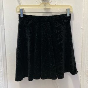 Black velvet mini skirt